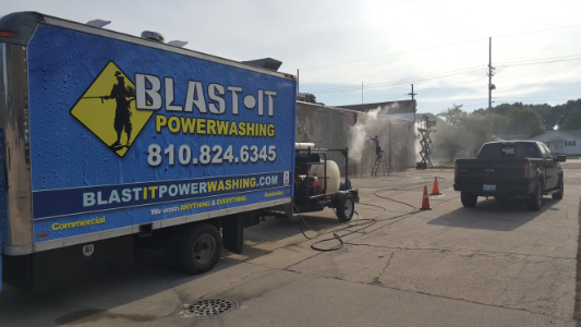 building siding being washed